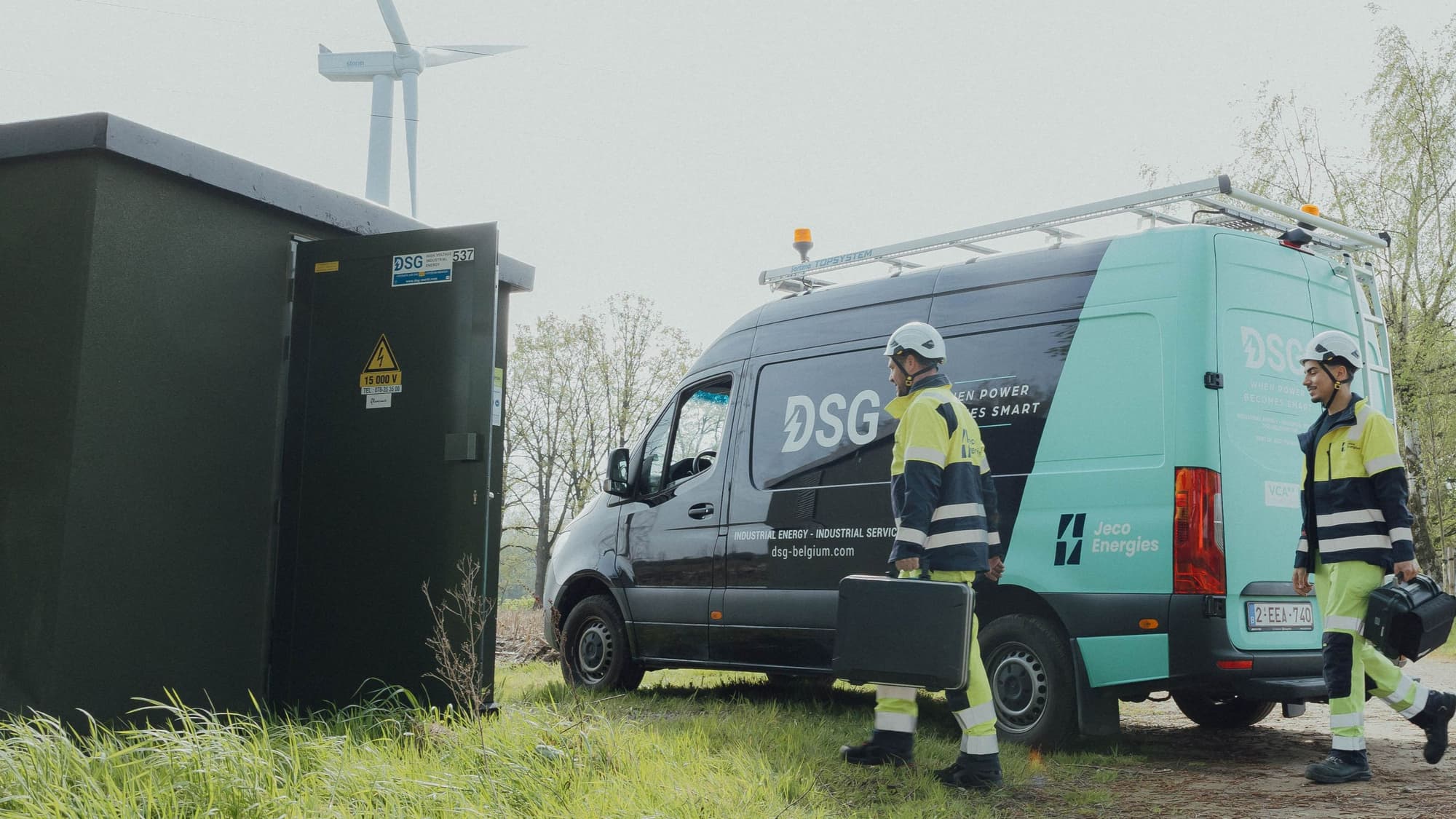 men at work with windmill